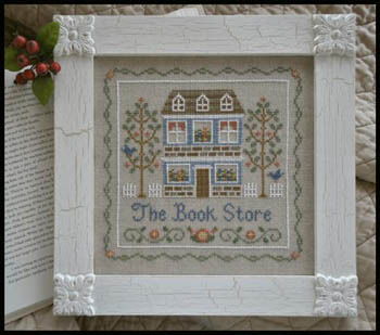 Country Cottage Needleworks - The Book Store-Country, Cottage, Needleworks, The, Book, Store, Cross, Stitch, Pattern, books, reading, store, building, trees, blue bird, white picket fence, flowers
